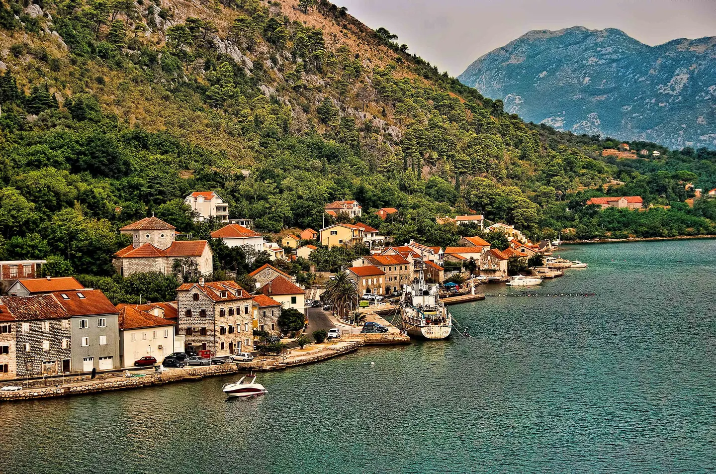 Waterfront houses and mountains at Dobrota on the Bay of Kotor